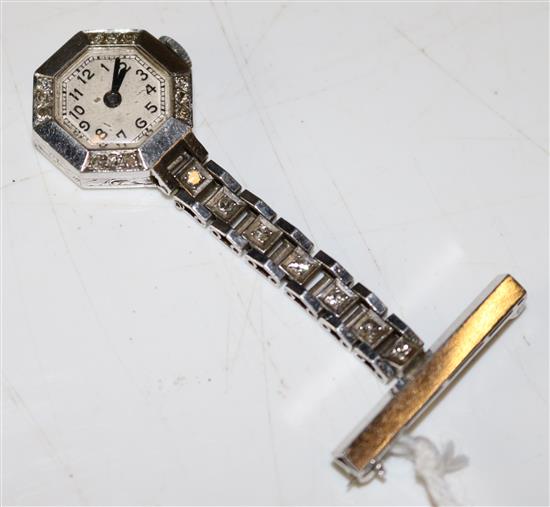 A ladys 1940s/1950s platinum and diamond lapel watch, overall 2in.